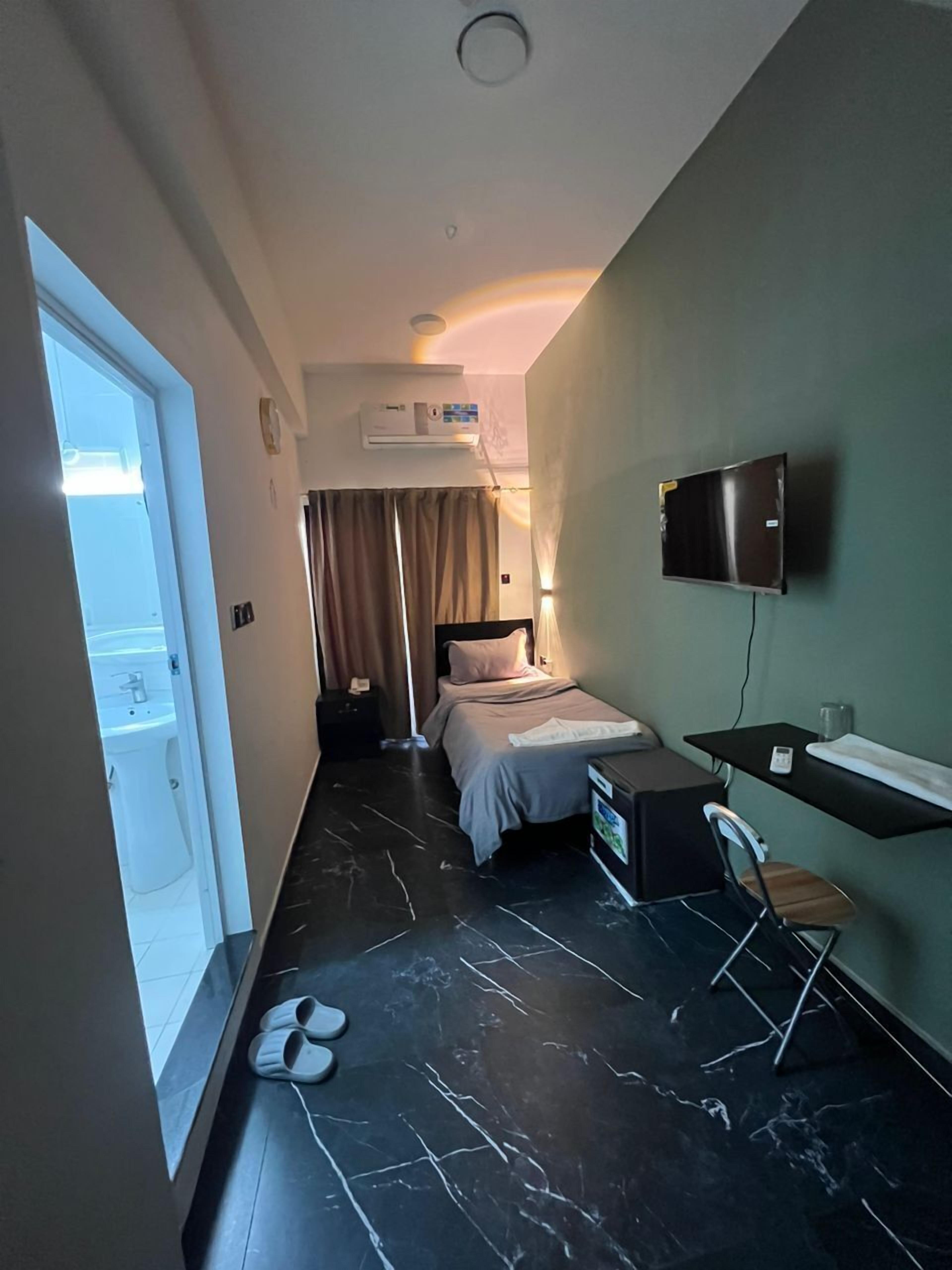 Guest Inn Hotel Llc