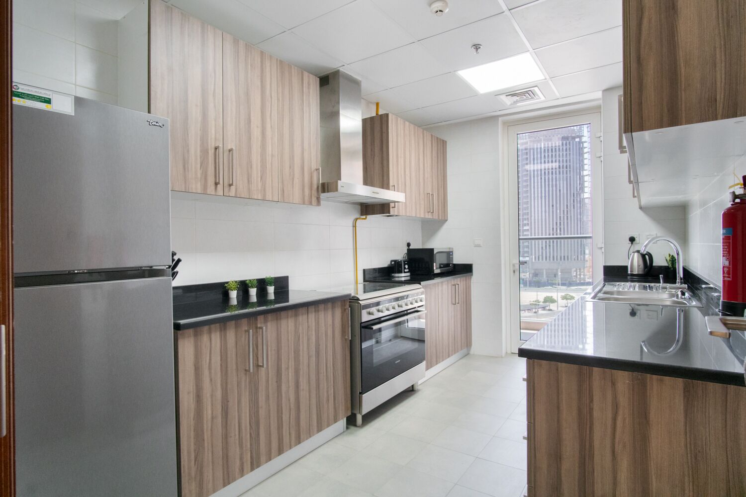 Luxe Apartments near Dubai Mall, Burj Khalifa - Pool, Gym, & Parking by Sojo Stay