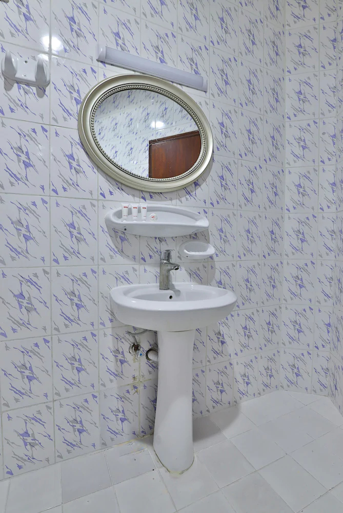 Sweet Palace Hotel by OYO Rooms