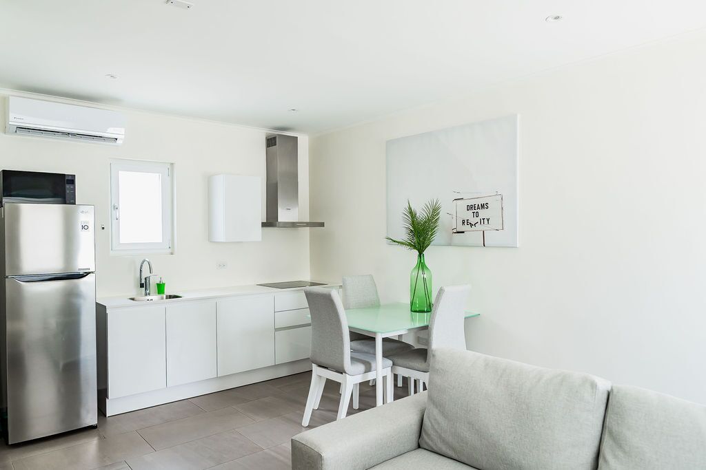 The Palm Leaf Apartments