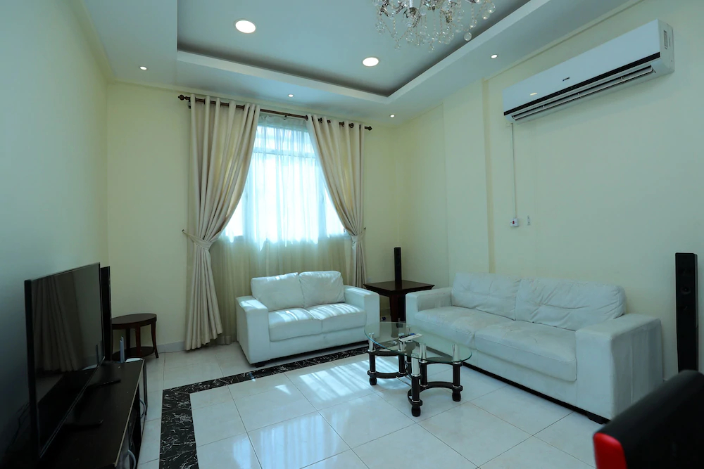 Grand Plaza Apartments by OYO Rooms