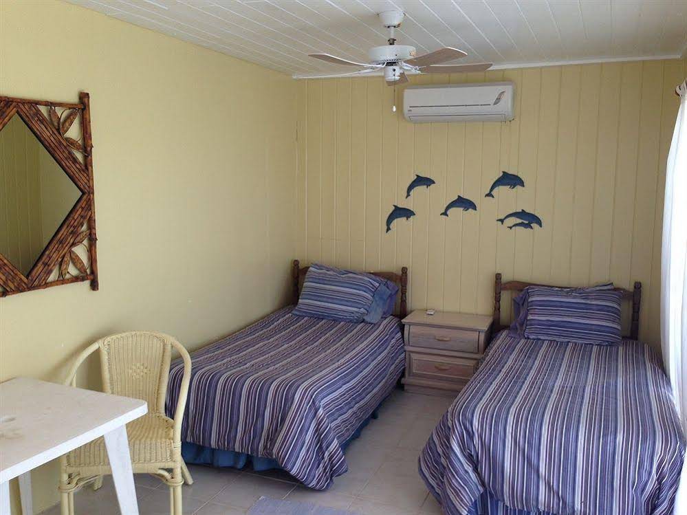 Wheel House Downstairs by Living Easy Abaco