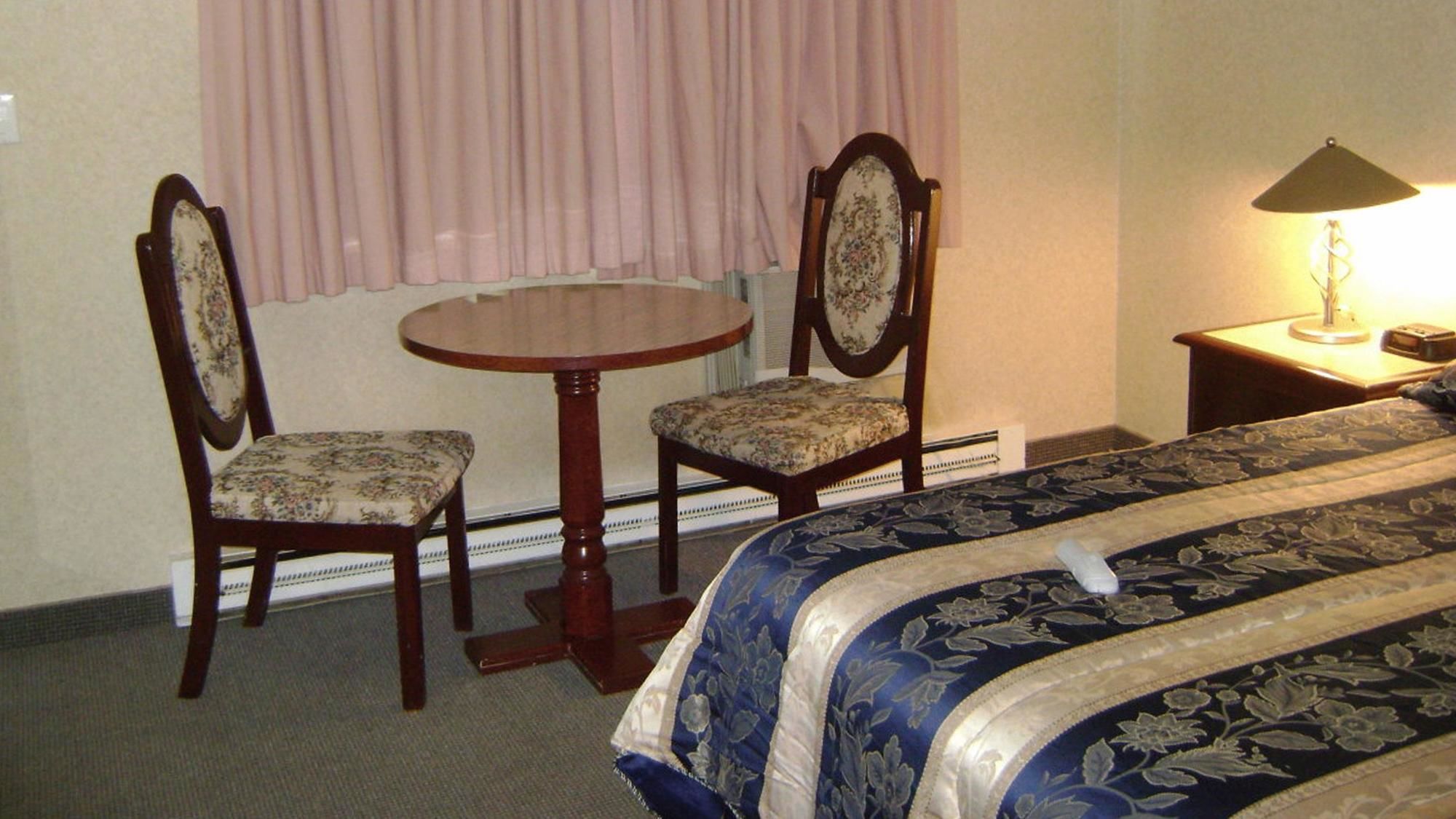 Magnuson Hotel Grace Inn