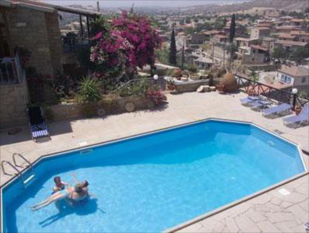 Adamos House