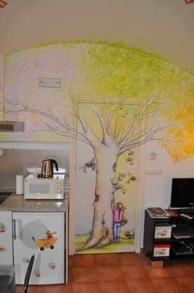 Apartamentos La Casa Pintada