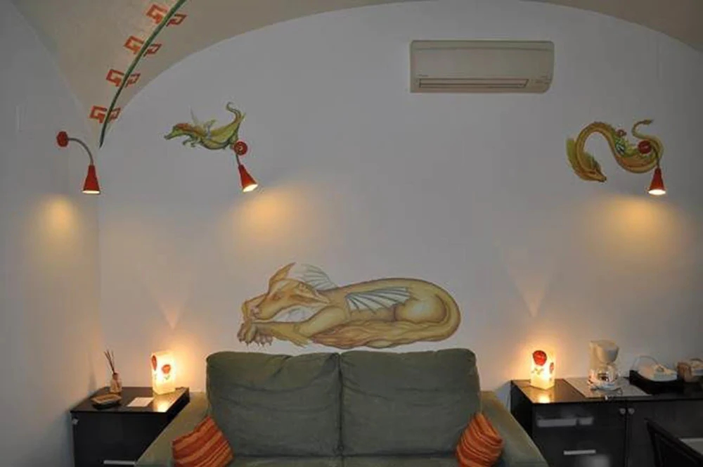 Apartamentos La Casa Pintada