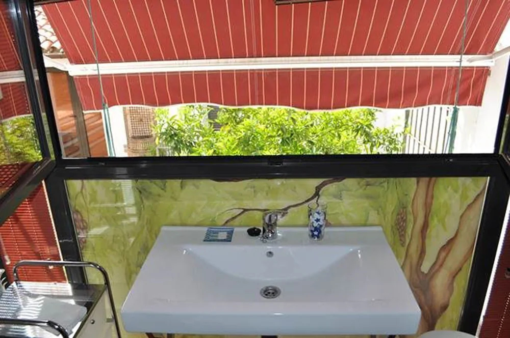 Apartamentos La Casa Pintada