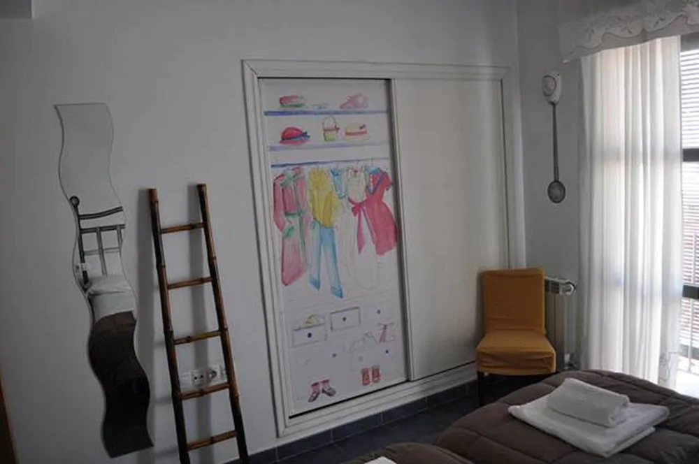 Apartamentos La Casa Pintada