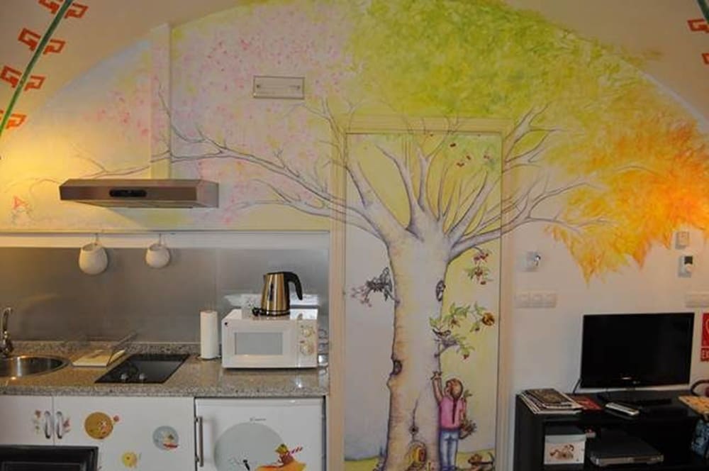 Apartamentos La Casa Pintada