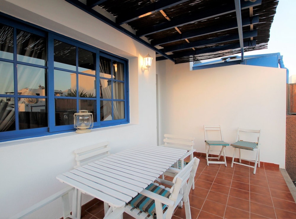 Casa Azul Acogedora y Moderna