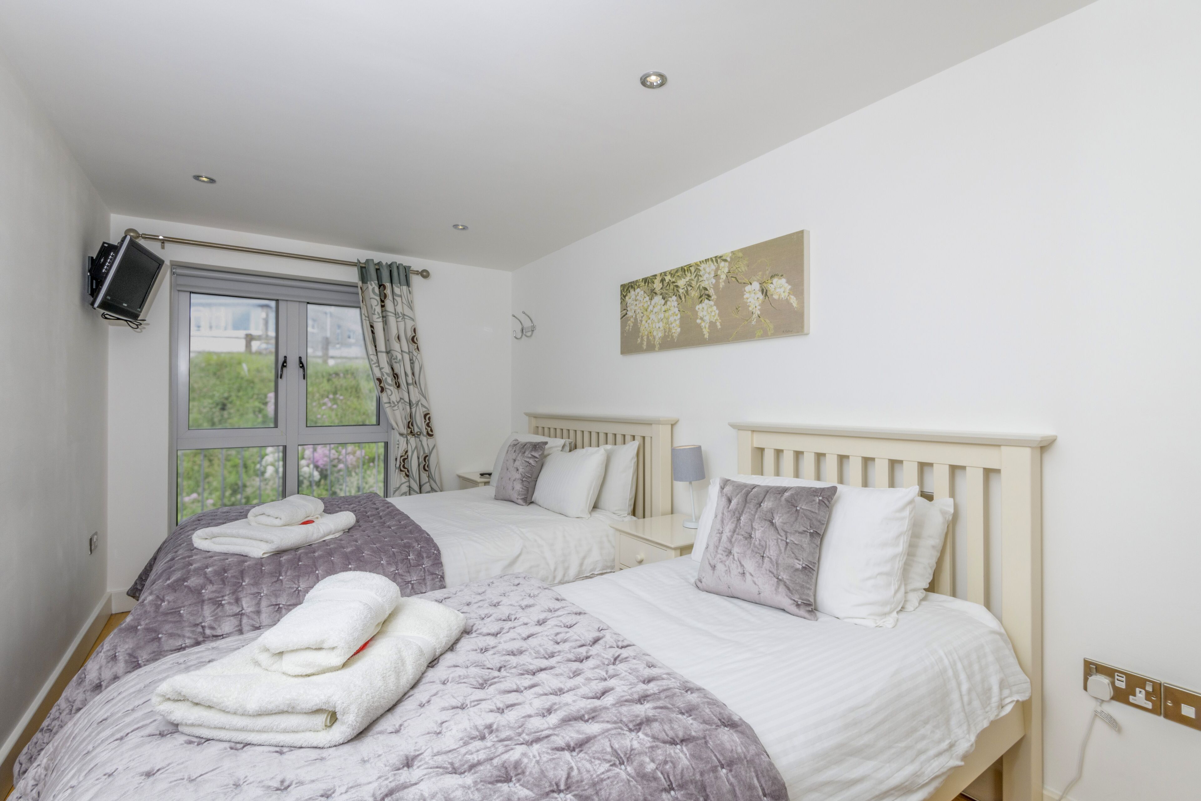 The Beach House & Porth Sands Apartments