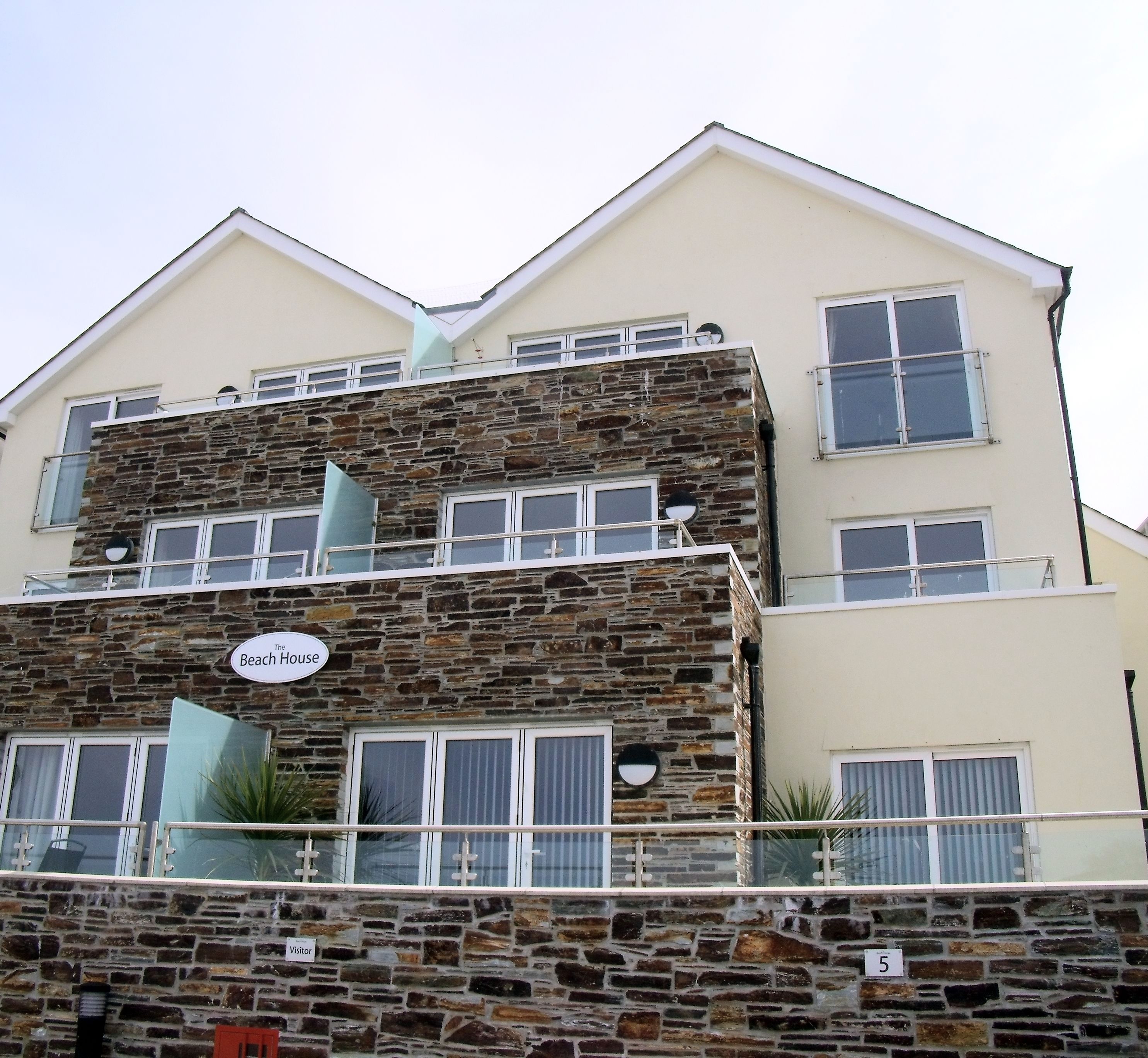 The Beach House & Porth Sands Apartments