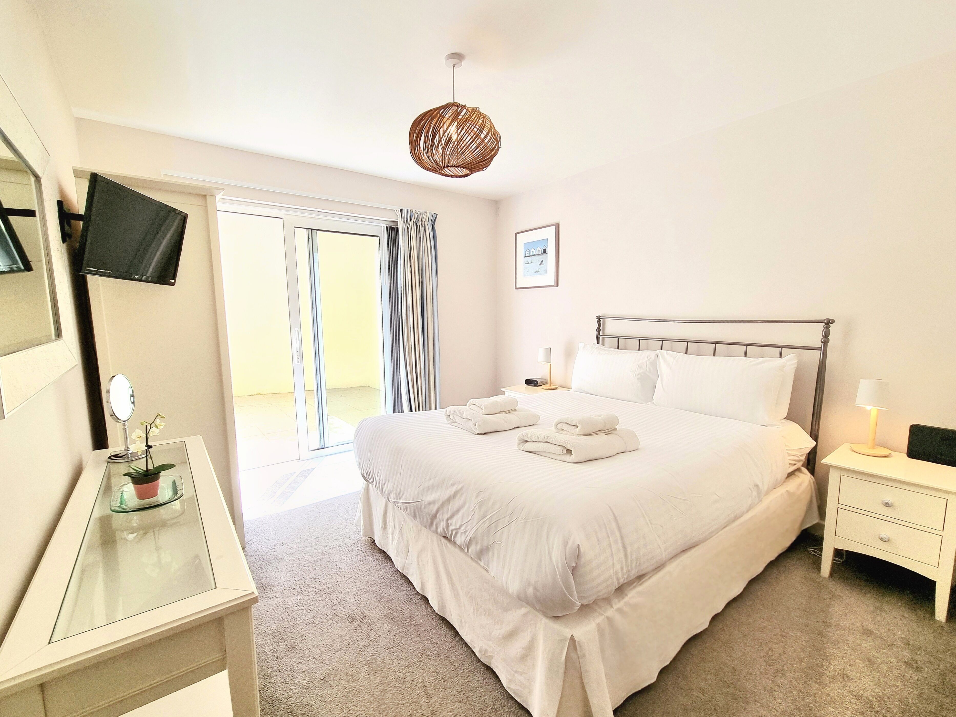 The Beach House & Porth Sands Apartments