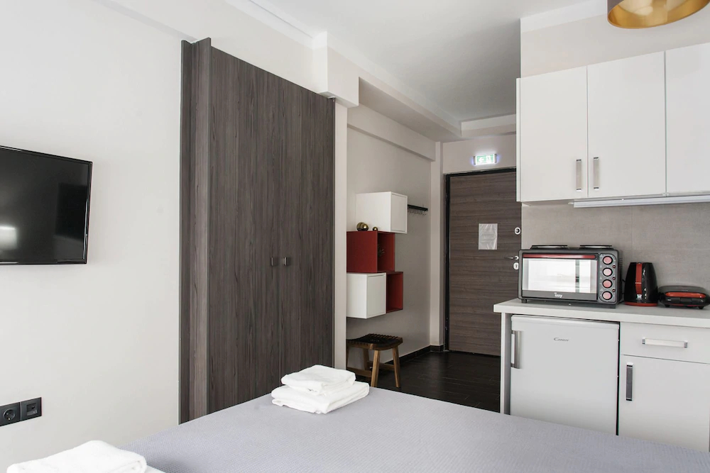 Athenian Downtown Studios by Livin Urbban