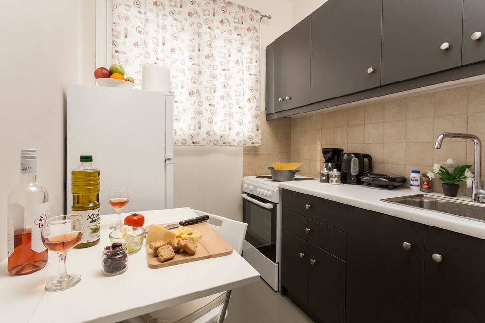 Homely Apartments by Athens Stay