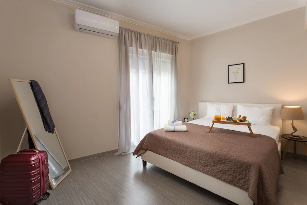 Homely Apartments by Athens Stay