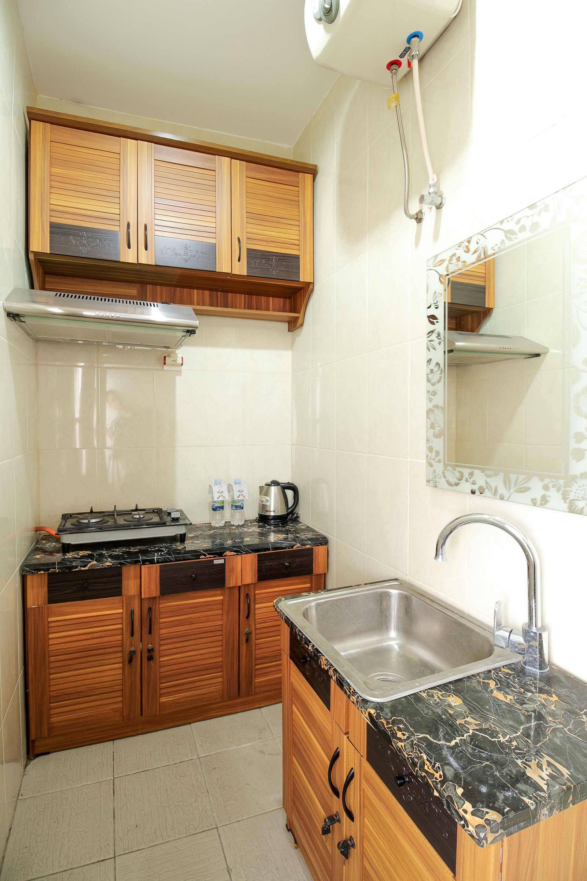 Tuban Torres Accomodation by OYO Rooms