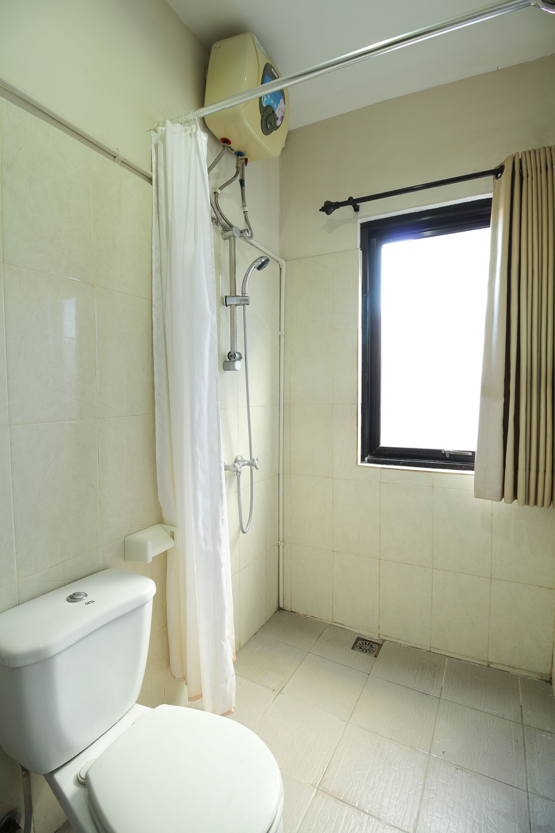 Tuban Torres Accomodation by OYO Rooms