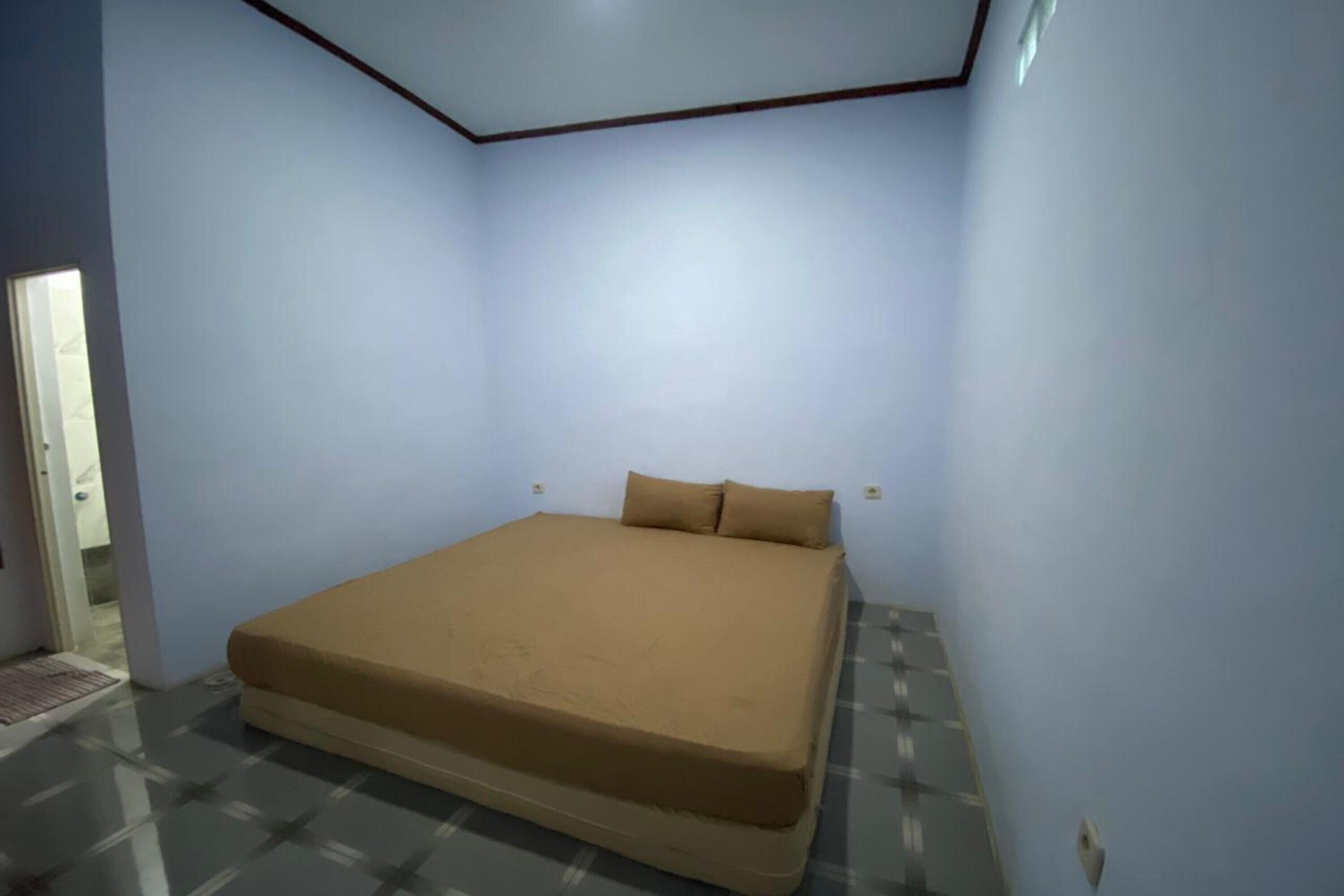 Spot On 93510 Penginapan Melati Tanjung