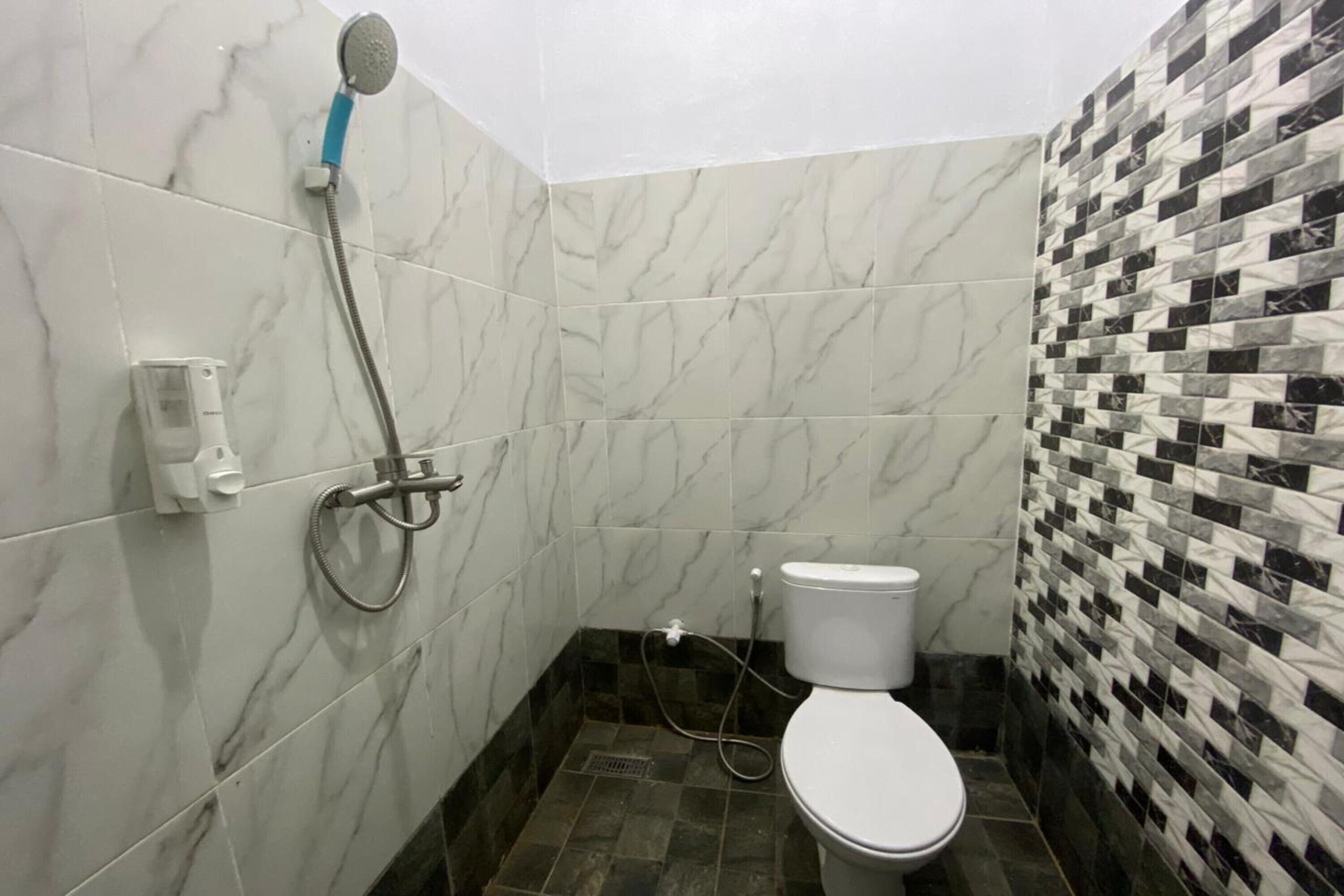 Spot On 93510 Penginapan Melati Tanjung