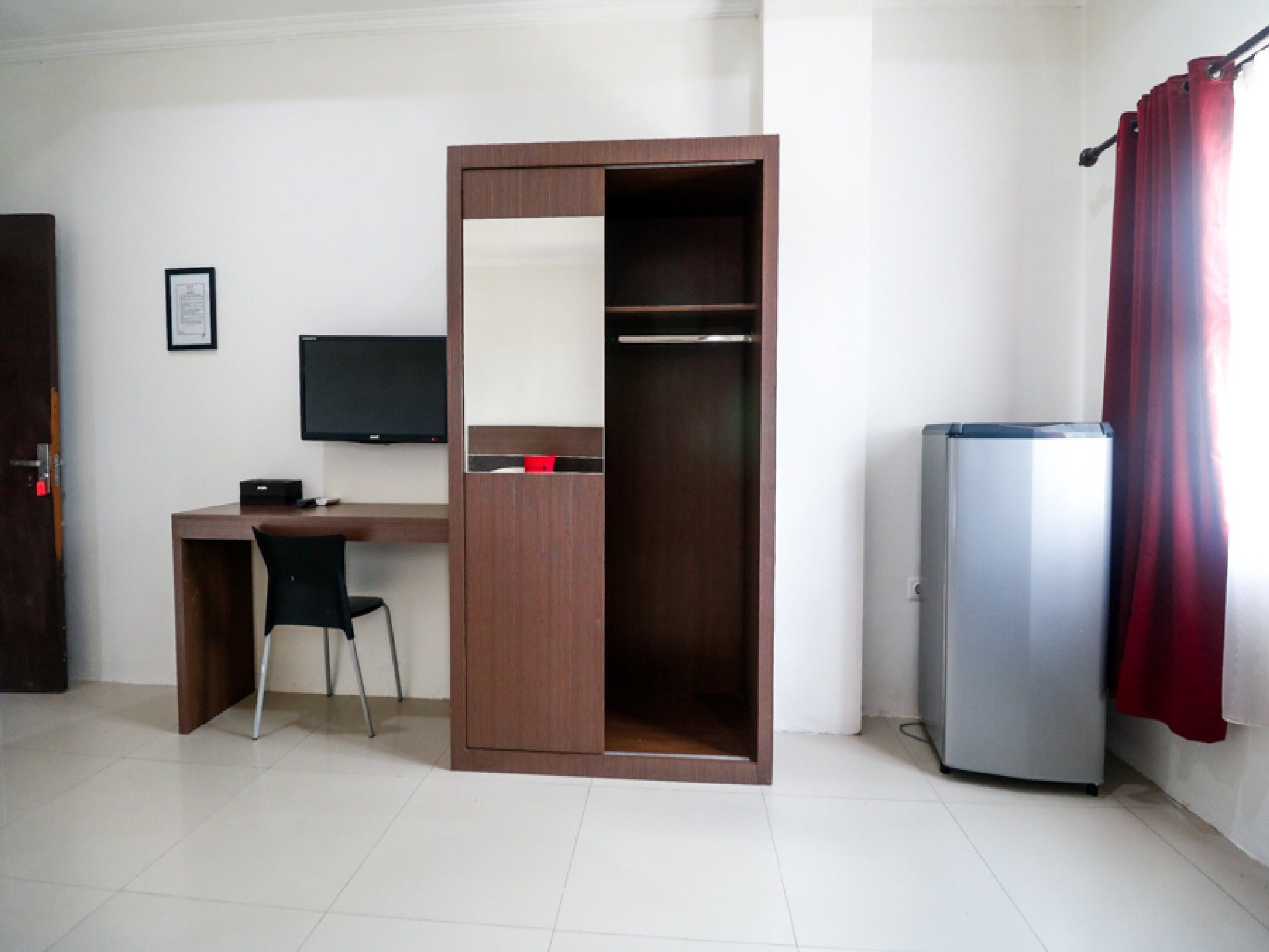 HER Mandiri Guest House by RedDoorz