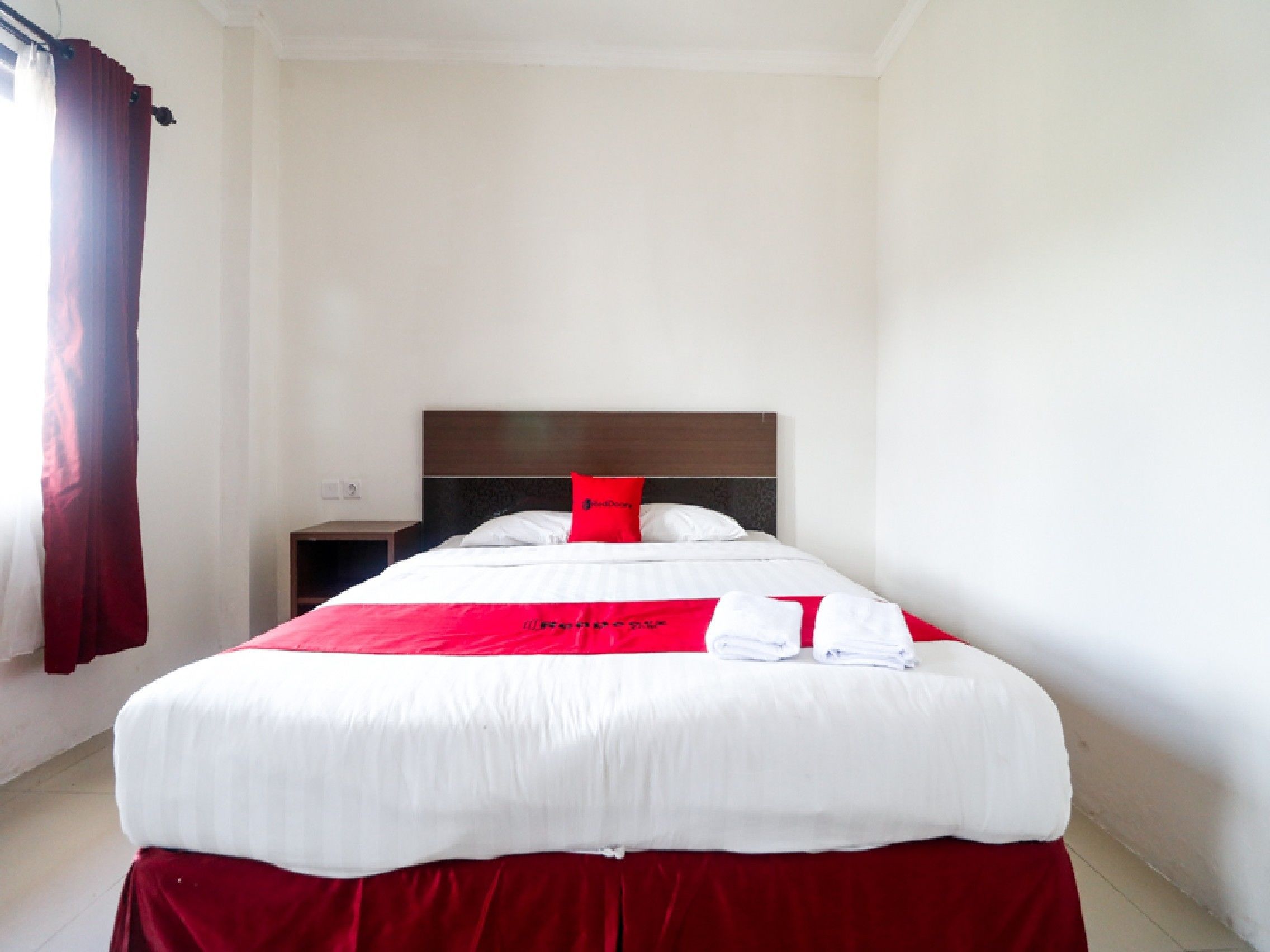 HER Mandiri Guest House by RedDoorz