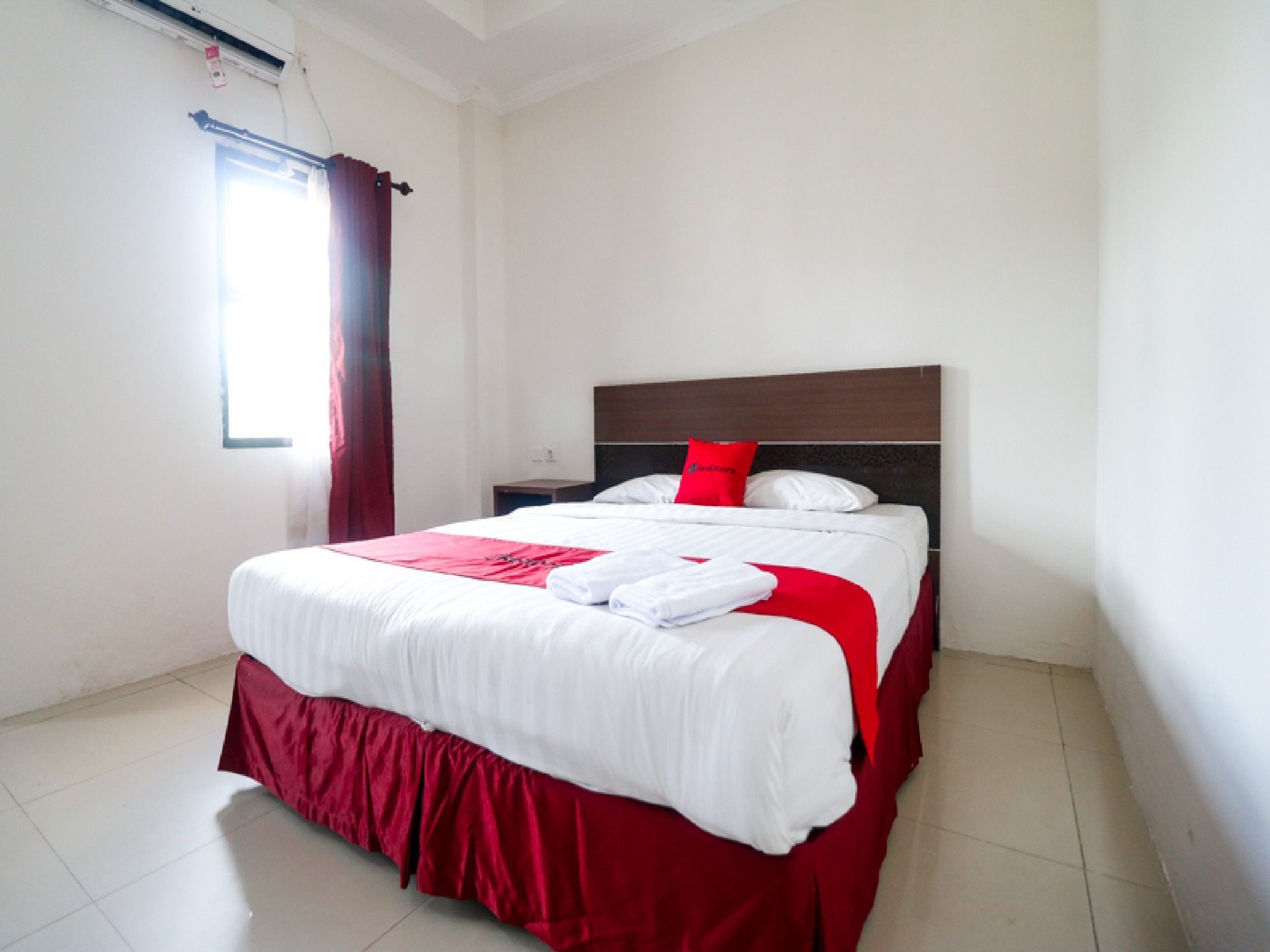HER Mandiri Guest House by RedDoorz