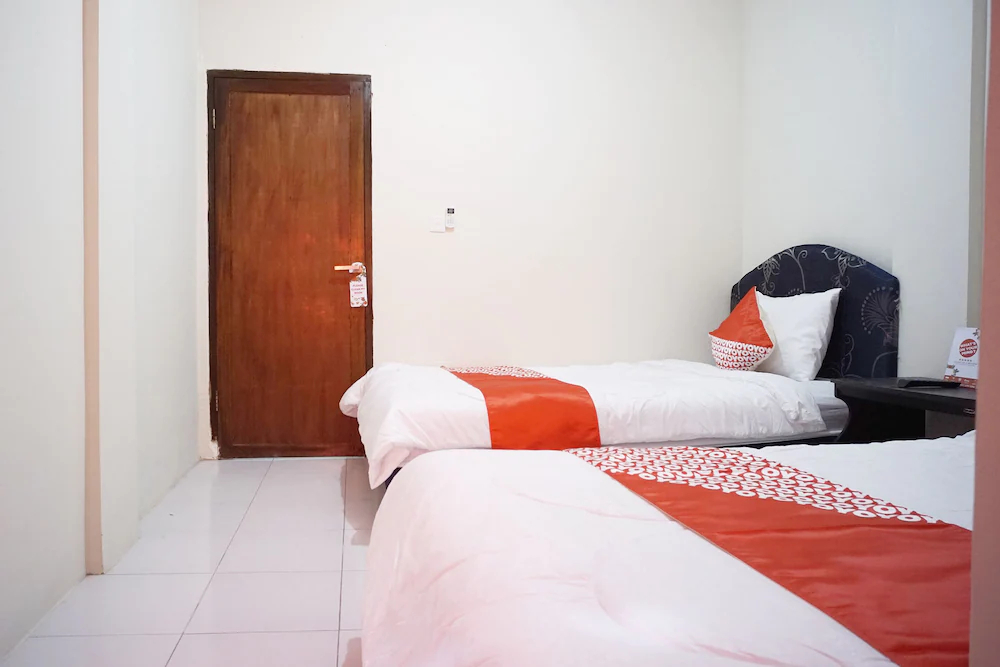 MIM Guest House Syariah by OYO Rooms