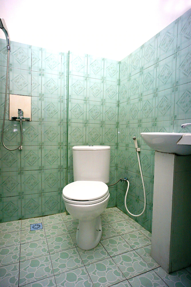 MIM Guest House Syariah by OYO Rooms