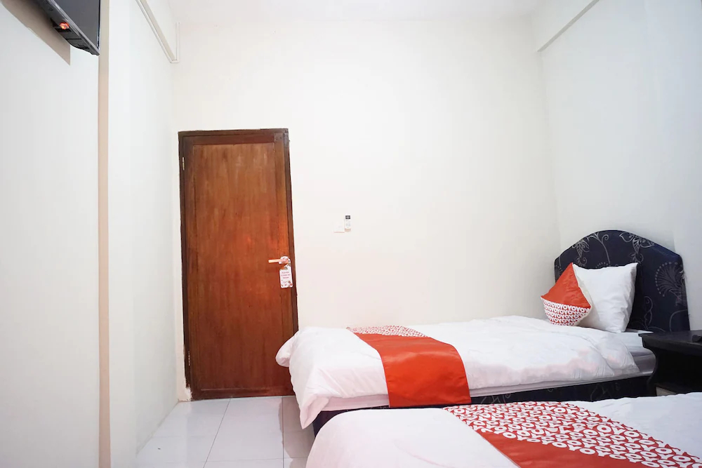 MIM Guest House Syariah by OYO Rooms