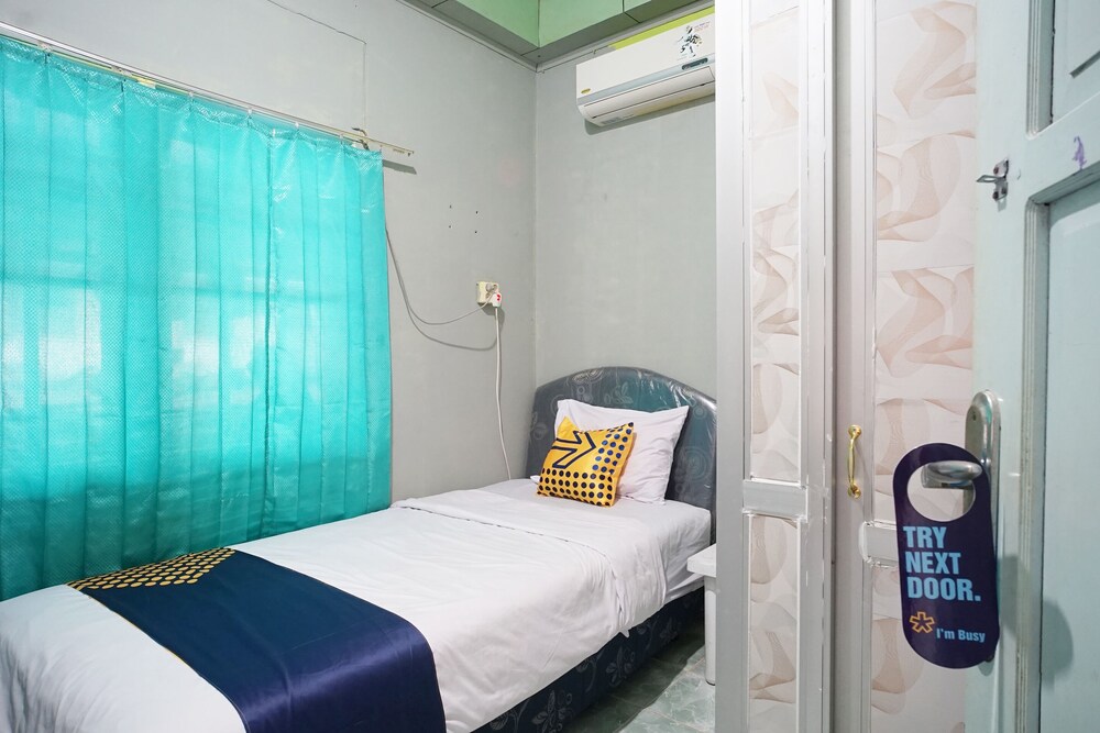 Sepinggan Asri Syariah Guesthouse by OYO Rooms