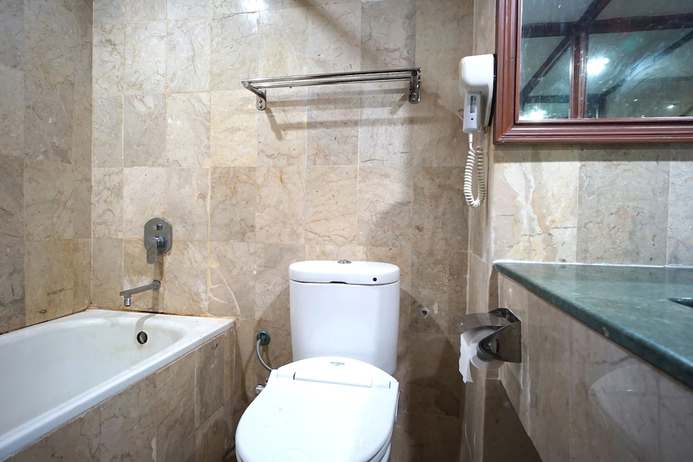 Capital O 1963 Hotel The New Benakutai