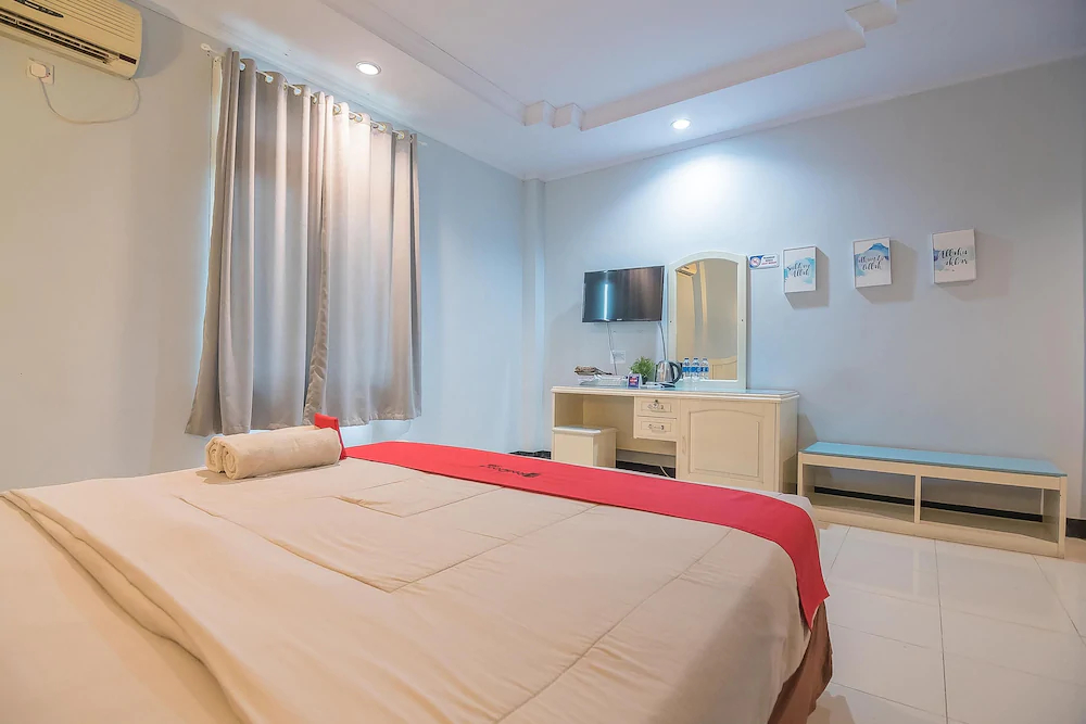 Grand Taufiq Hotel by RedDoorz