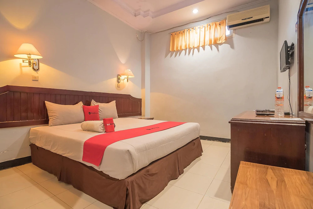 Grand Taufiq Hotel by RedDoorz