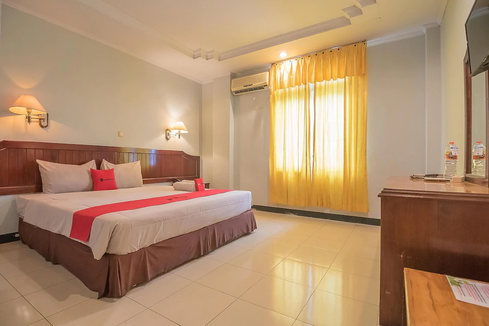 Grand Taufiq Hotel by RedDoorz
