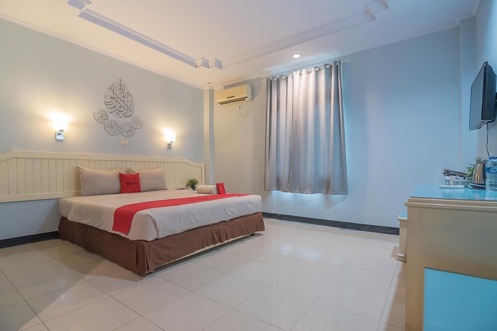Grand Taufiq Hotel by RedDoorz
