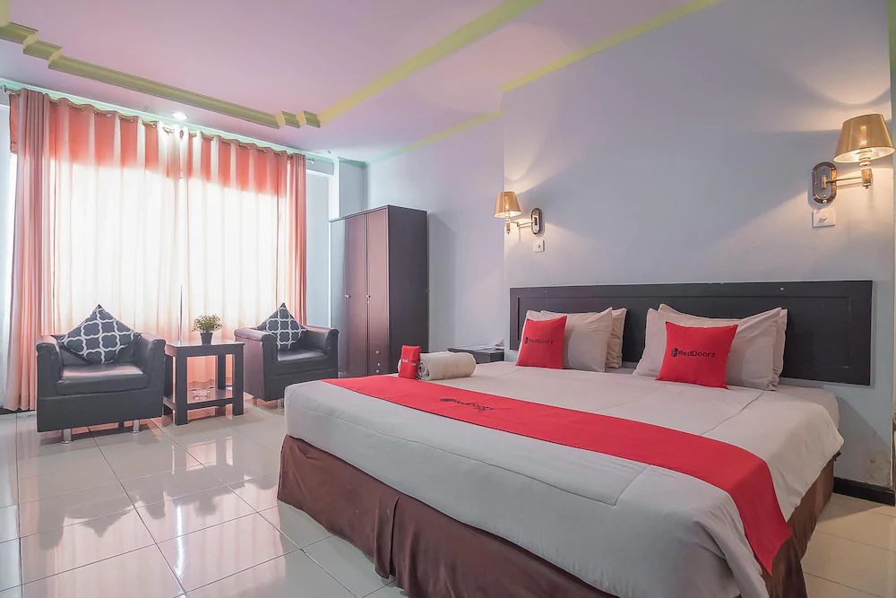 Grand Taufiq Hotel by RedDoorz