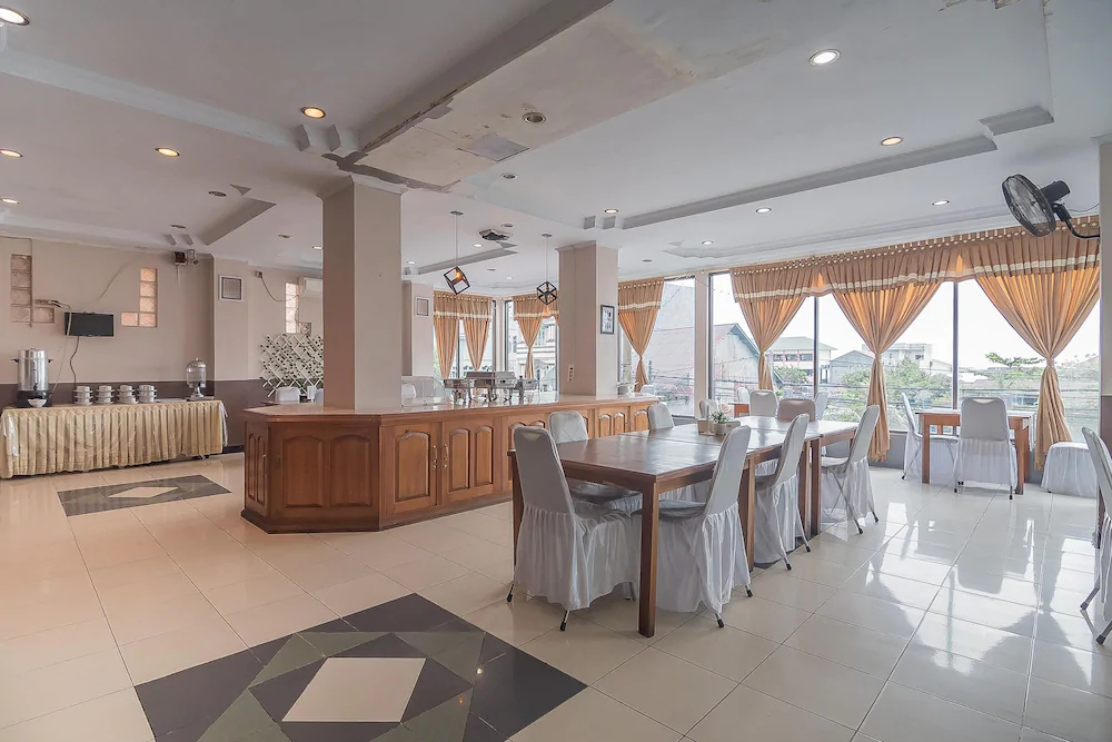Grand Taufiq Hotel by RedDoorz