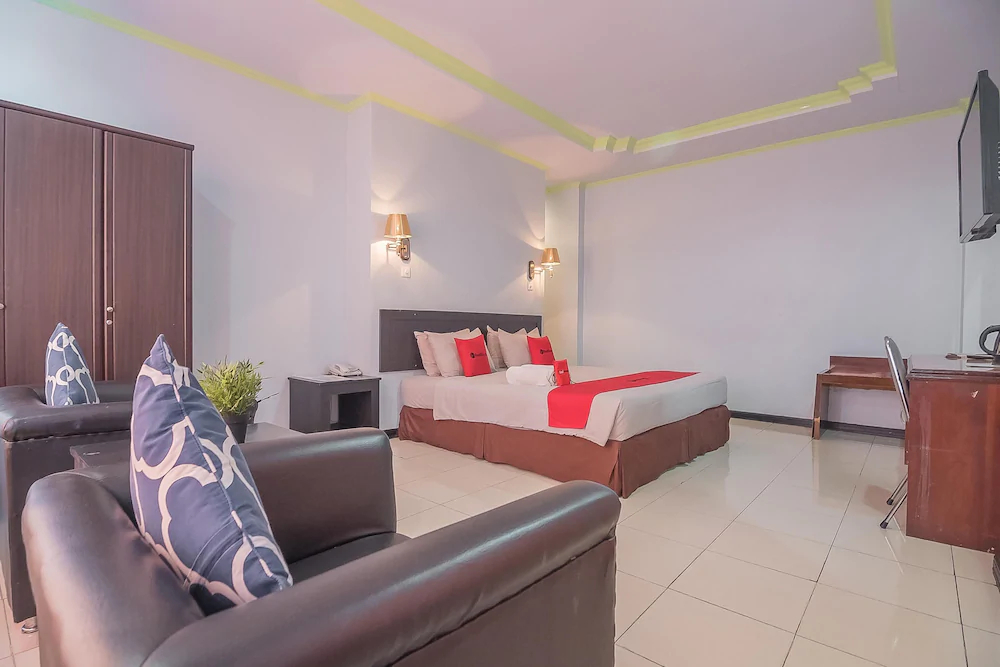 Grand Taufiq Hotel by RedDoorz