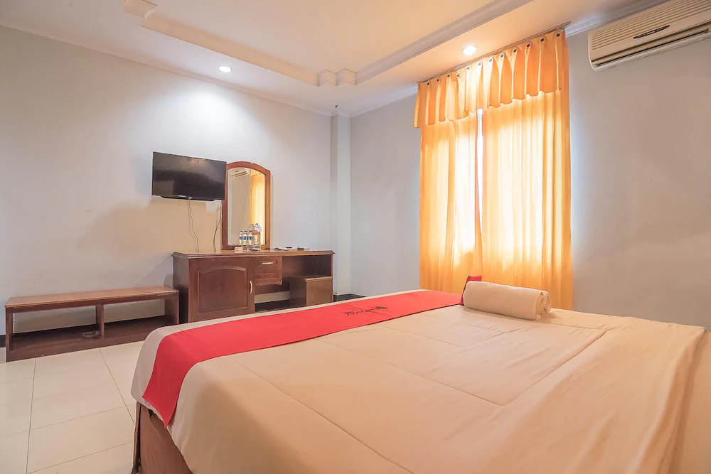 Grand Taufiq Hotel by RedDoorz