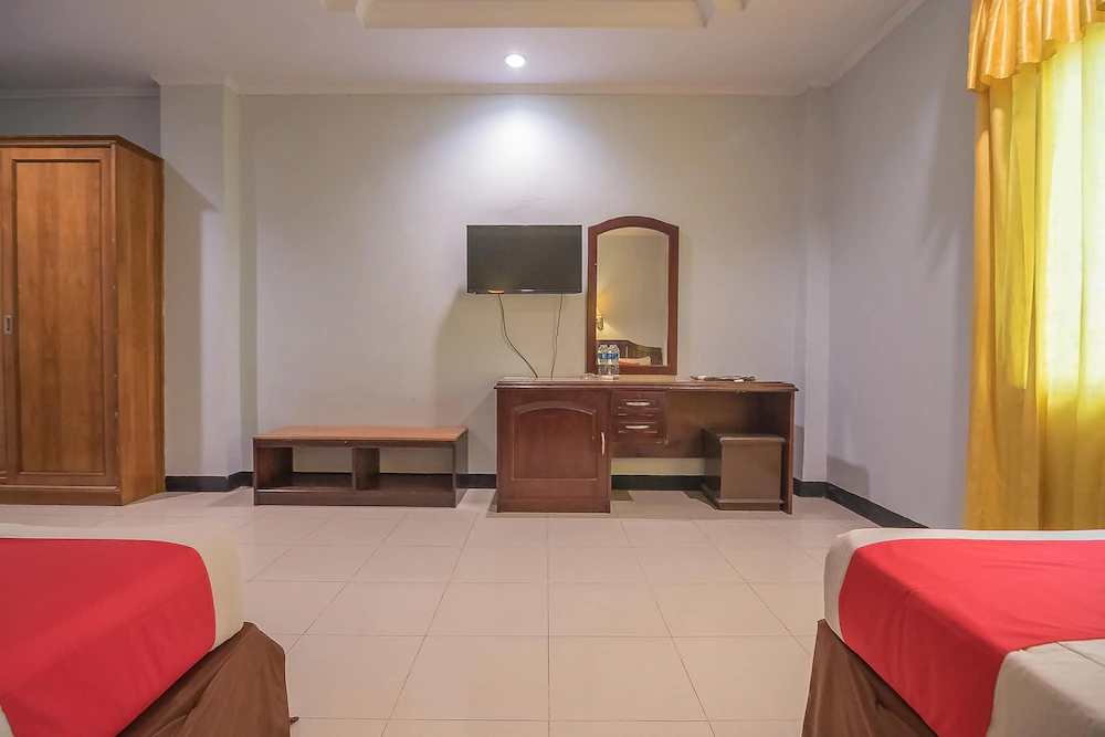 Grand Taufiq Hotel by RedDoorz