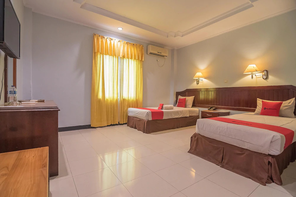 Grand Taufiq Hotel by RedDoorz