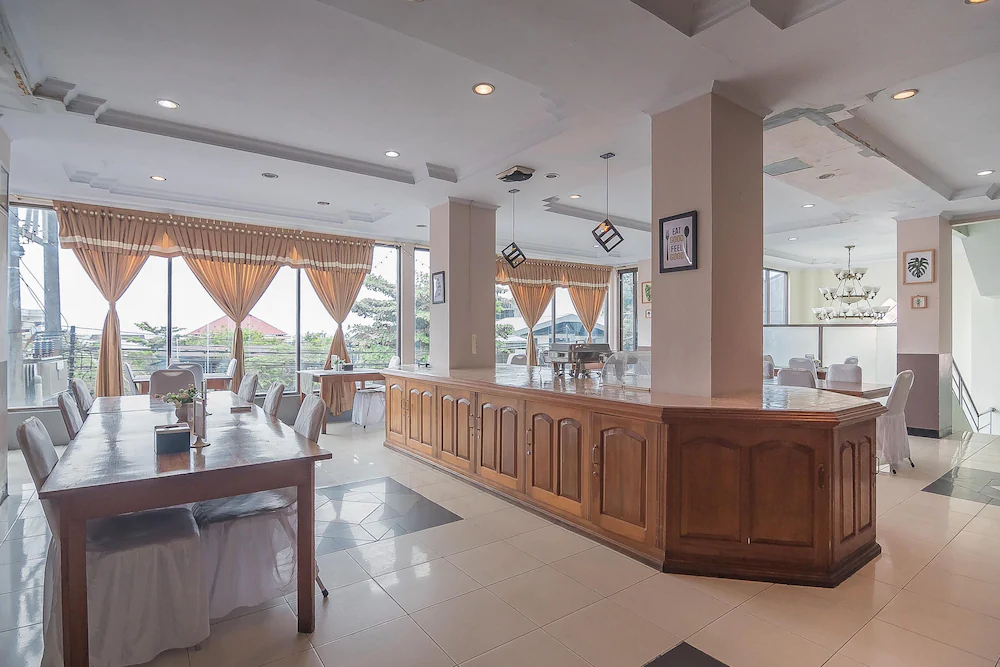 Grand Taufiq Hotel by RedDoorz