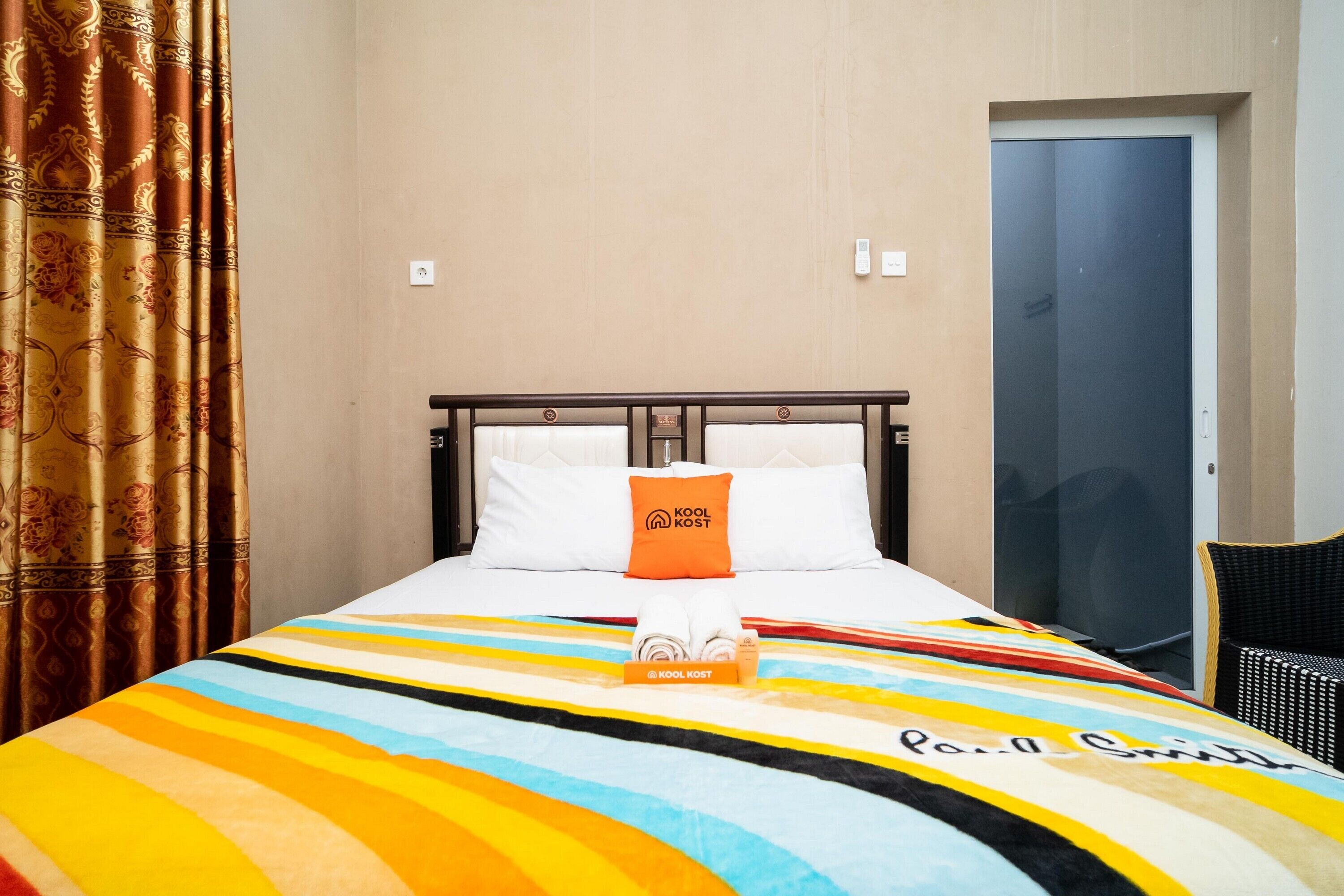 Sitiinggil Guesthouse by RedDoorz