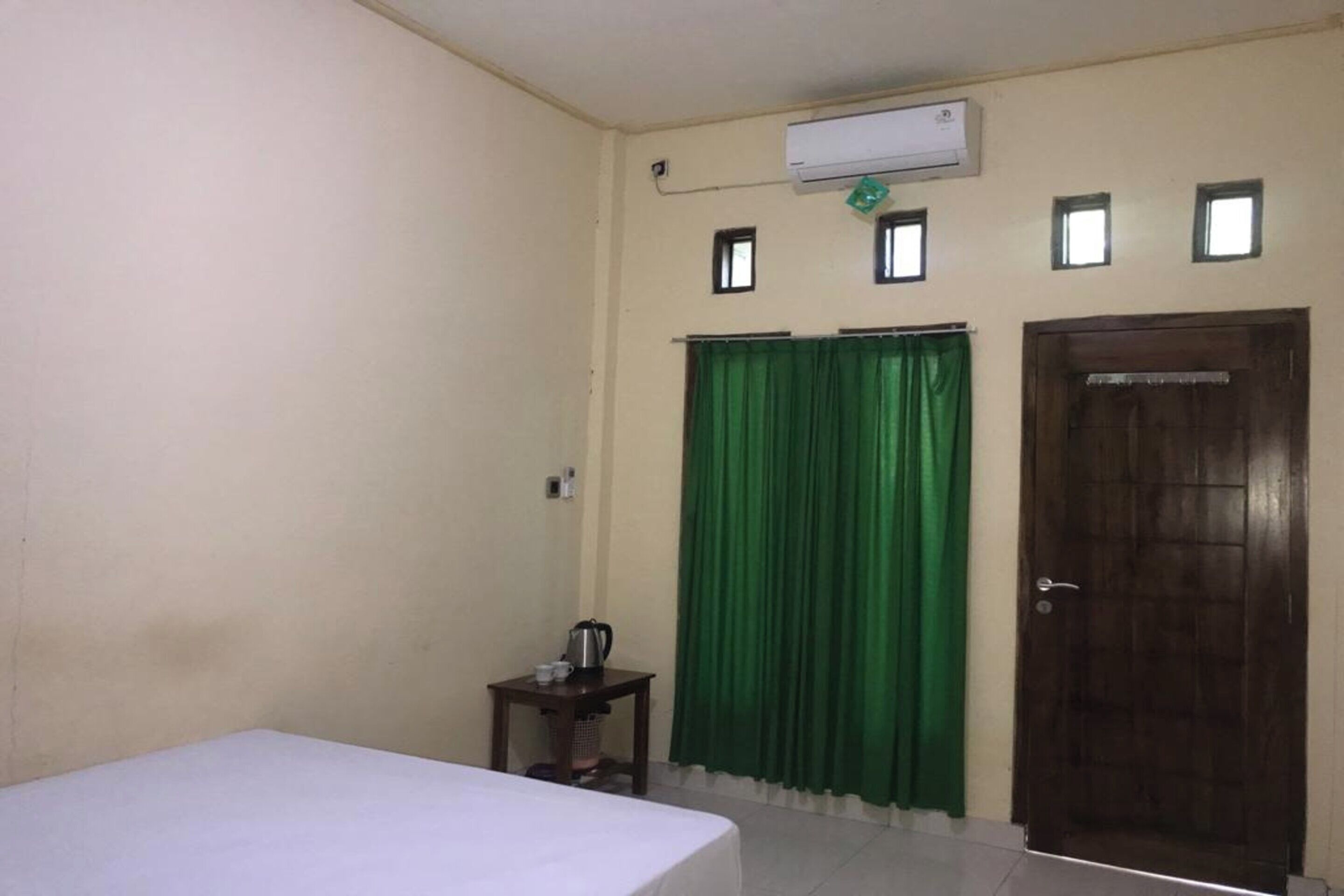Penginapan Mc Lodge By OYO