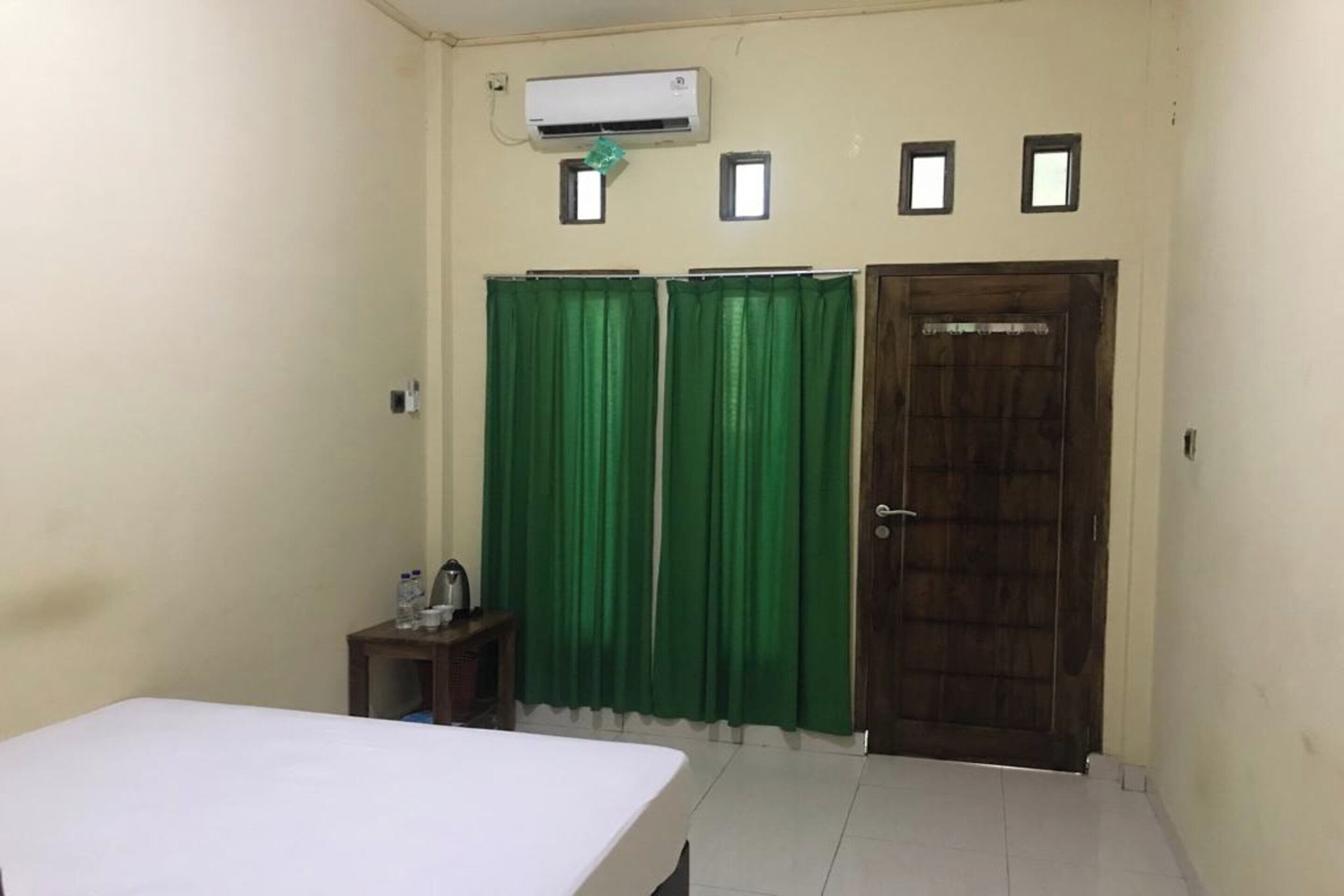 Penginapan Mc Lodge By OYO