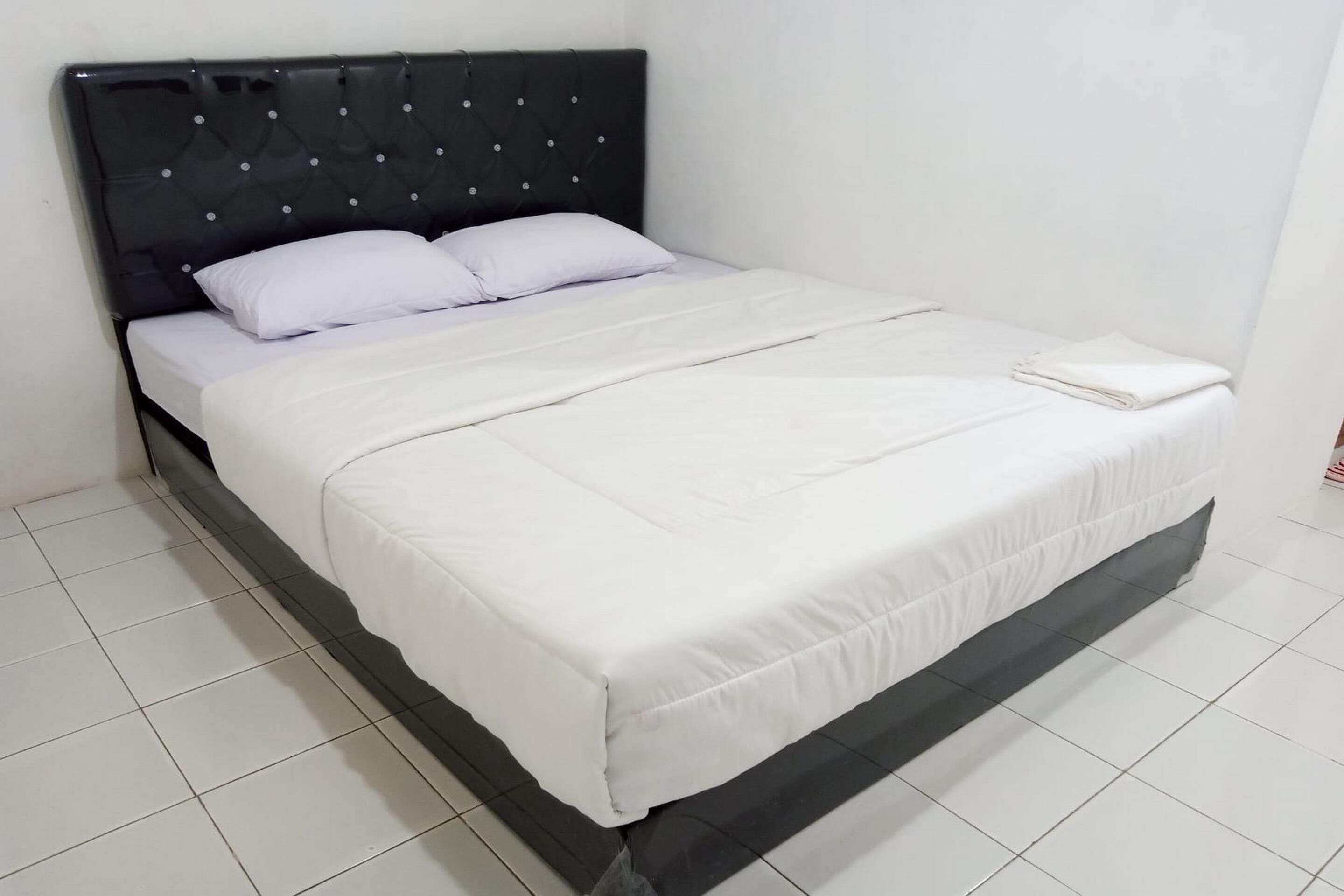 Capital O 93728 Guest House Cemara