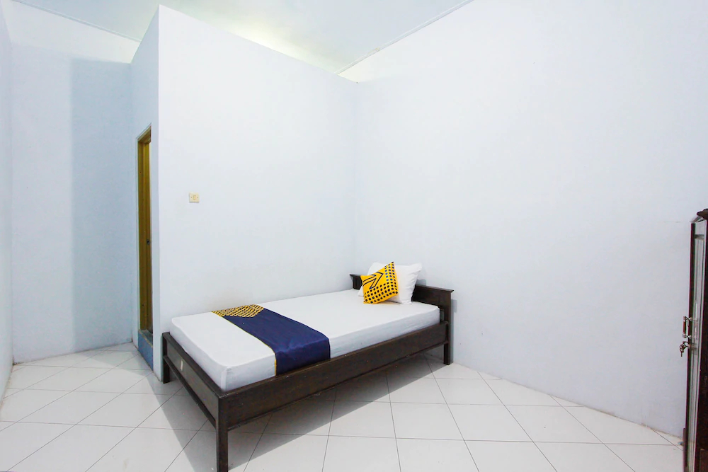 Kost Mittasukha Family by OYO Rooms