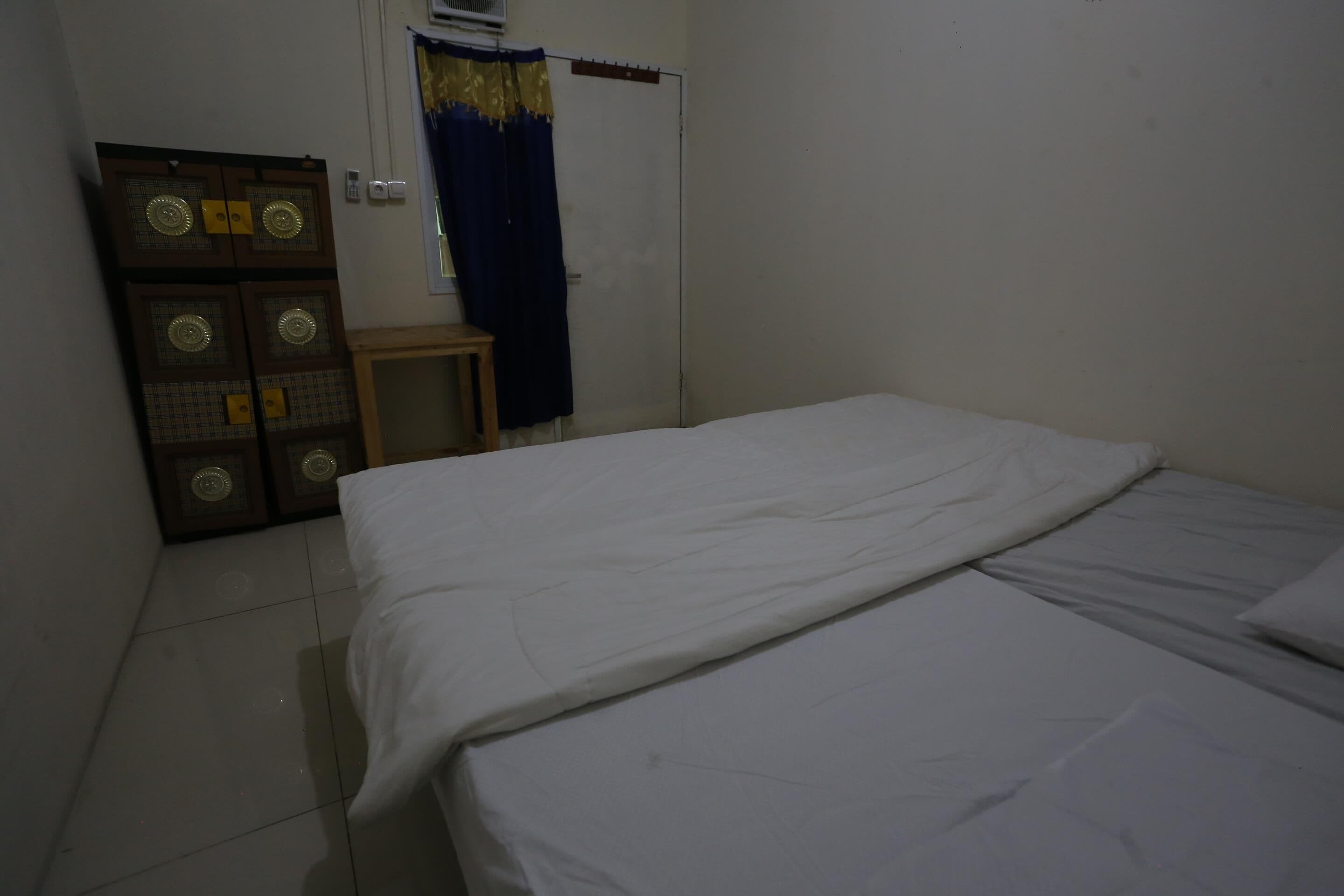 SPOT ON 93827 Rumah Kost Harapan Indah