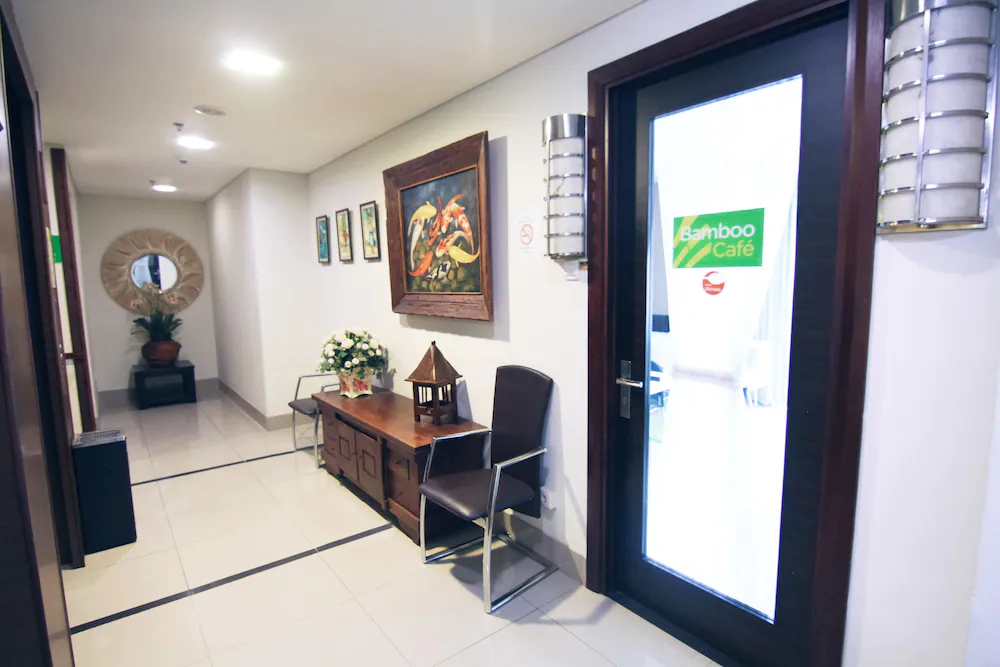 Bamboo Inn Hotel & Cafe by Airy Rooms